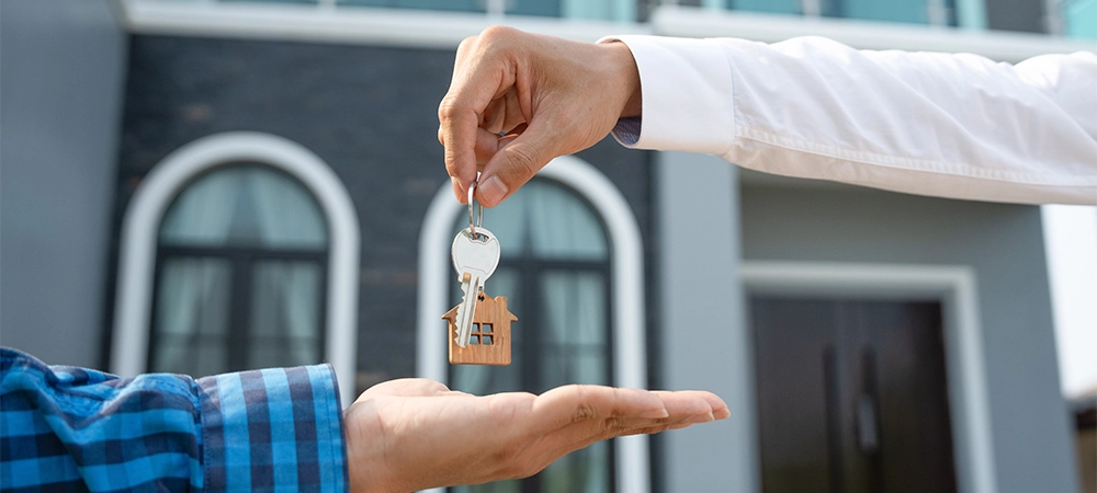 lease, rental and selling home. Real estate agent manager smile holding key for new owner. rent house, Sales, loan credit financial, insurance, Seller, dealer, installment, buy, sell, move in